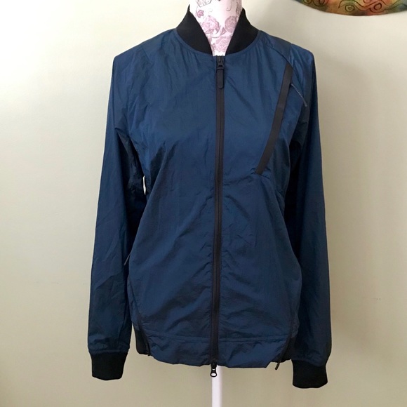 NIKE Tech Pack Varsity Jacket - Picture 1 of 8